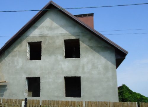 Отделка дома при помощи штукатурки Дом отделанный штукатуркой